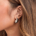 Introducing our Tear Drop Earrings.  Lightweight.   Material: Stainless Steel.  tarnish free waterproof