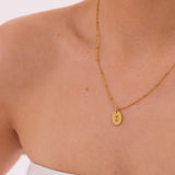 Engraved Oval Pendant Necklace