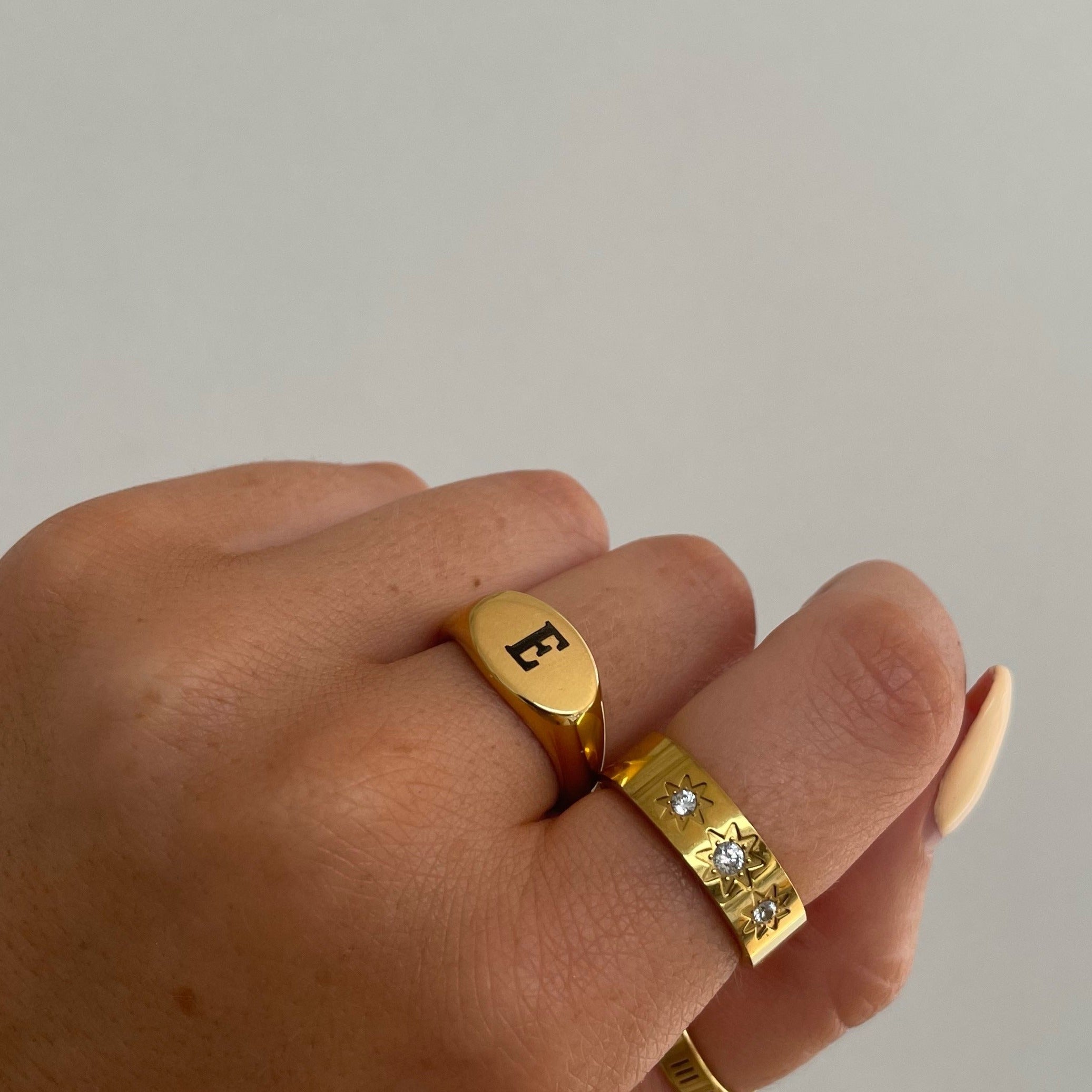 Introducing our Staple Signet RIng from our Personalised Collection! All of our pieces are laser engraved- this means it will not fade over time! Available in Gold & Silver. Material: Titanium.