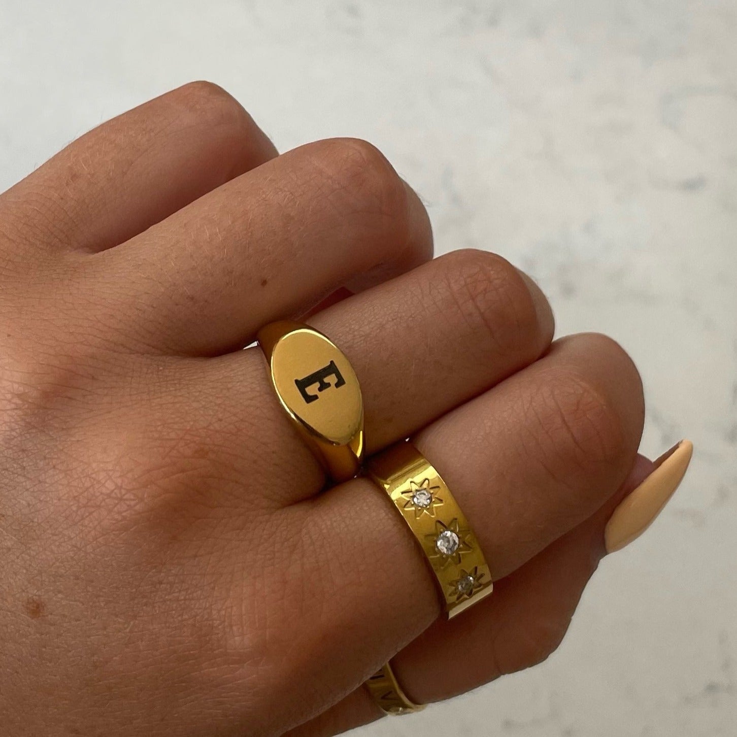 Introducing our Staple Signet RIng from our Personalised Collection! All of our pieces are laser engraved- this means it will not fade over time! Available in Gold & Silver. Material: Titanium.