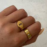 Introducing our Staple Signet RIng from our Personalised Collection! All of our pieces are laser engraved- this means it will not fade over time! Available in Gold & Silver. Material: Titanium.