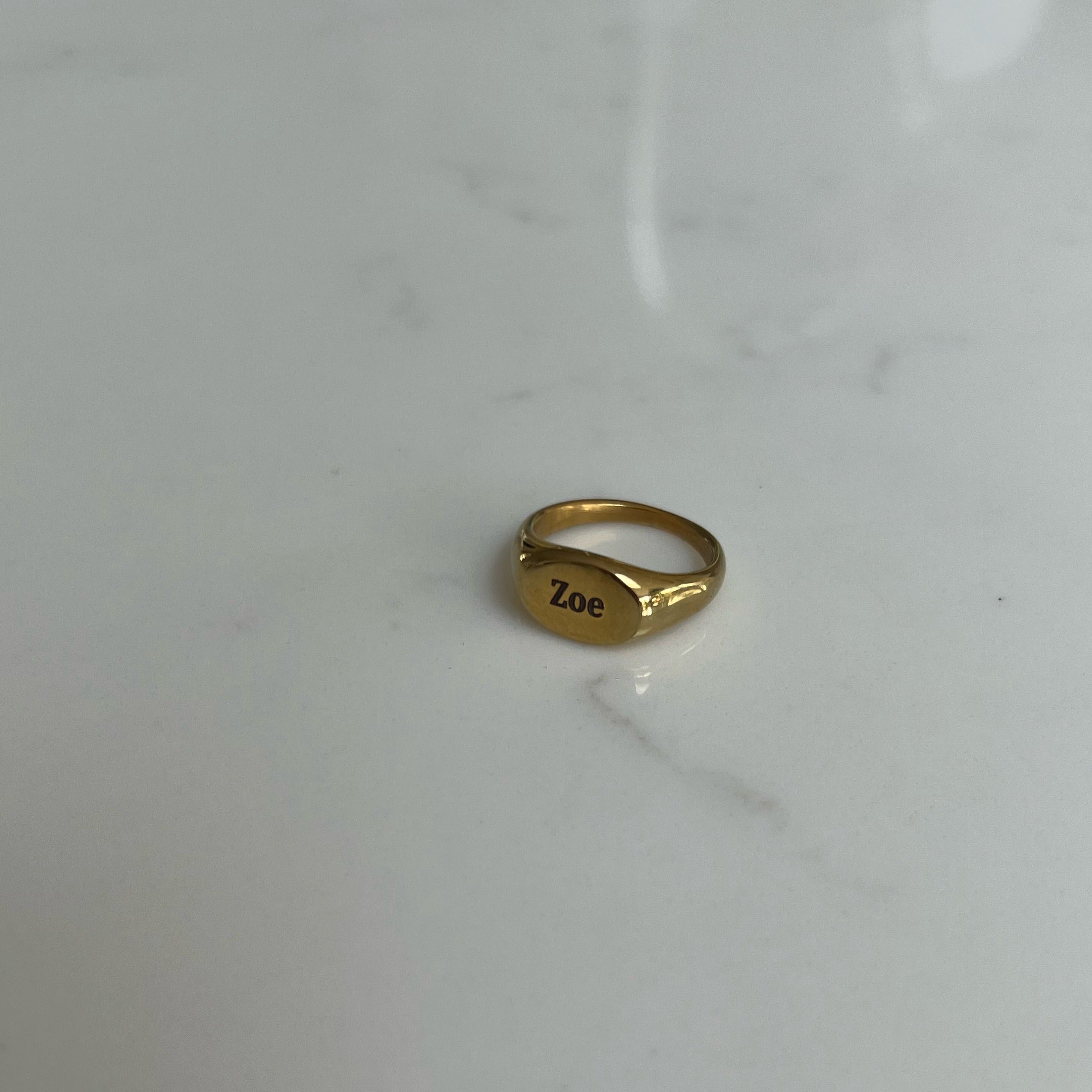 Introducing our Staple Signet RIng from our Personalised Collection! All of our pieces are laser engraved- this means it will not fade over time! Available in Gold & Silver. Material: Titanium.