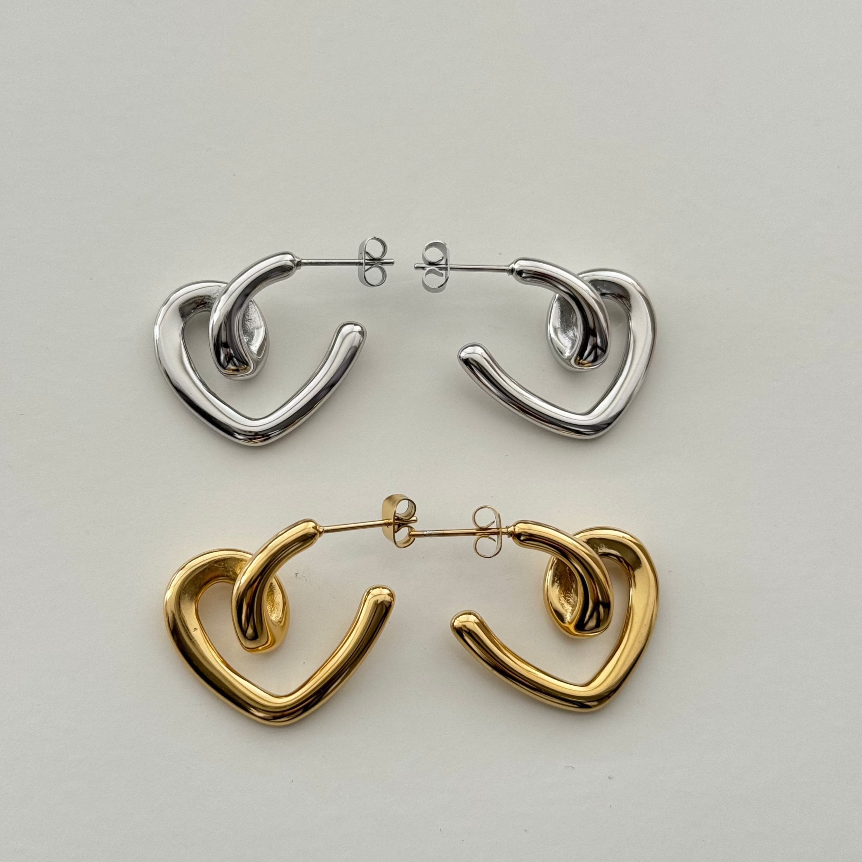 Introducing our Heart Twist Earrings. Featuring an Irregular Heart Twist Design.  High Quality Stainless Steel Waterproof Tarnish Free Lightweight