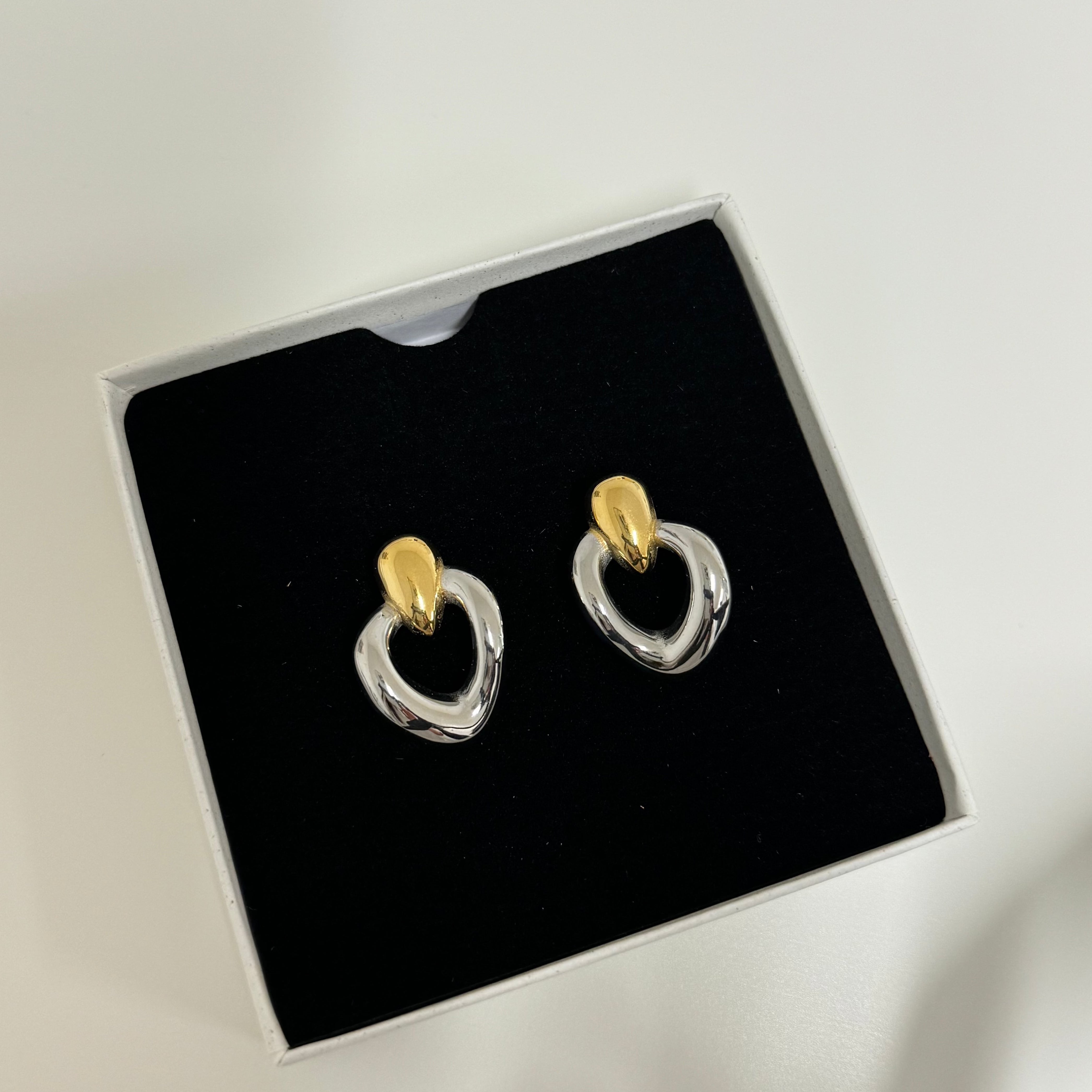 Introducing our Two Tone Statement Earrings.  The perfect hoops to start 2024 as mixed metals will be a fashion trend this year!  High Quality Stainless Steel Waterproof Tarnish free 