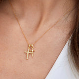 Introducing our Dainty Double Cross Necklace  Perfect for layering.  Material: 925 Sterling Silver. 