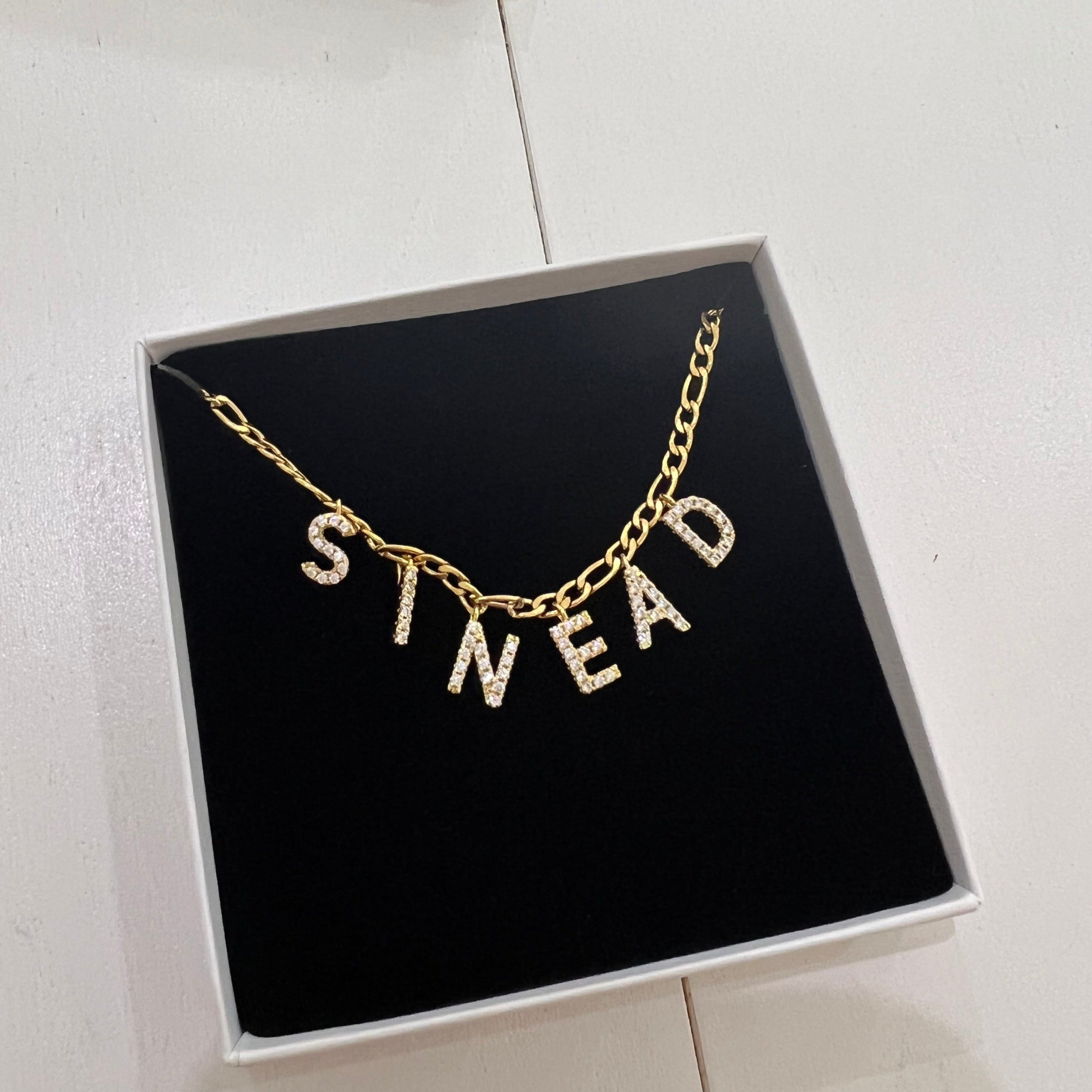 Introducing our first piece from our New Personalised Collection that has been in the making for months!  *LEAVE A NOTE AT CHECKOUT WITH THE PERSONALISED NAME YOU WANT ON THE NECKLACE*  High Quality Stainless Steel Cubic Zirconia Pendant Necklace.  1-4 Letters- €31.99  5-7 Letters- €34.99  8+ Letters- €37.99