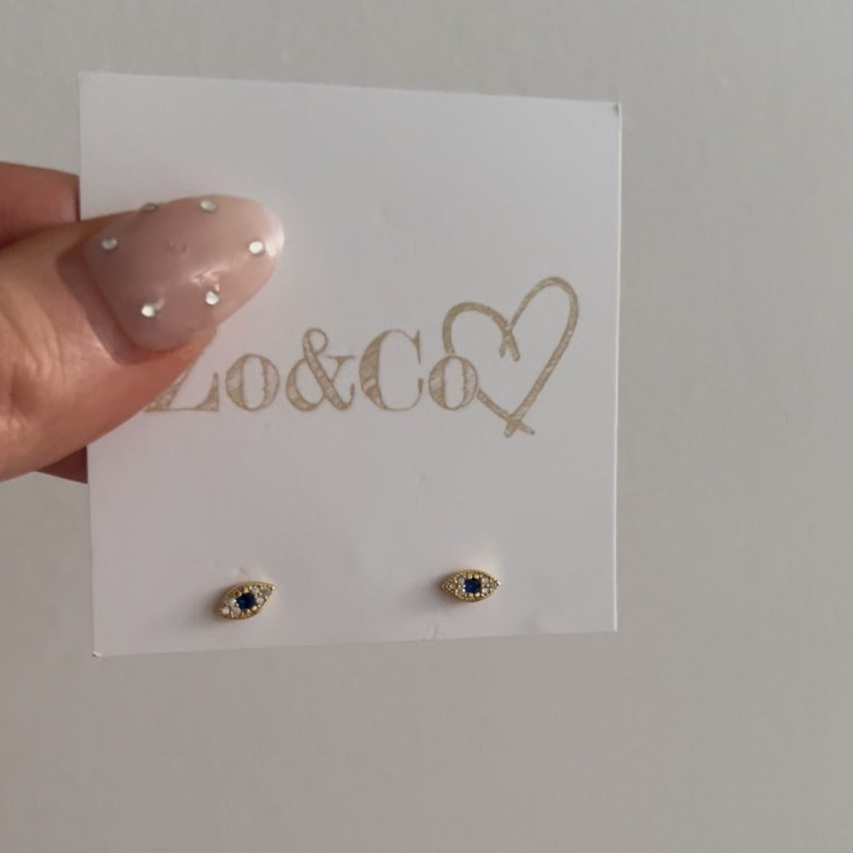 Evil Eye Sparkle Stud Earrings.  Available in Gold & Silver.  Material: 925 Sterling Silver. 