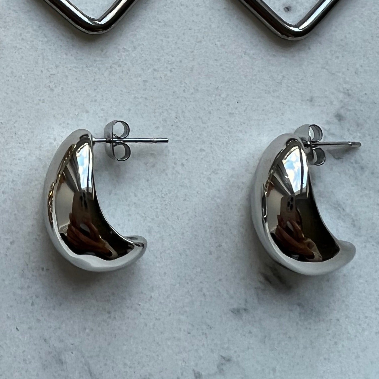 Millie Hoops Retro C-Shape Mini Hoops. Material: Titanium. zoandco jewellery ireland Dublin affordable luxury